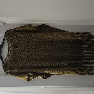 Knit fringe cape